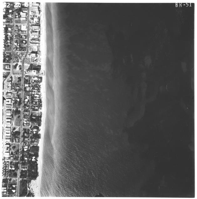Aerial survey photographs of Miami Beach along coast and A1A Collins Ave - Photograph, recto: [A1A (Collins Avenue) looking north from around 79th to 88th Street]