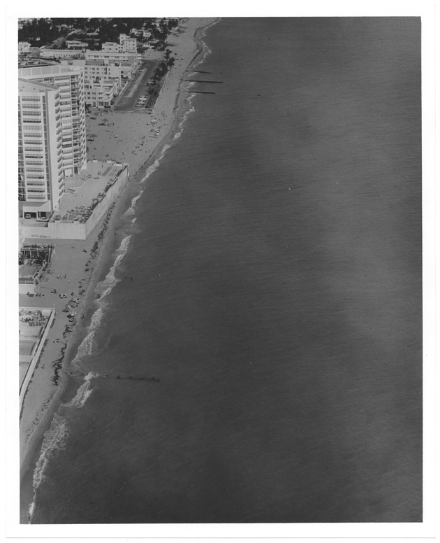 Aerial view of oceanfront hotels and buildings looking north - Recto