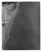 Aerial view of oceanfront hotels and buildings looking north