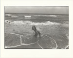 Old woman at the beach