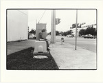 Elderly man on power box