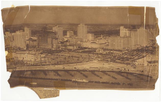 View of Miami's business district after the 1926 hurricane published in The New York Times - Clipping, recto: [View of Miami's business district after the 1926 hurricane, from the ocean. Text reads "The "New York of Florida" recovers from great calamity..."]