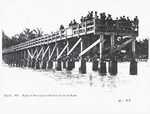 A pier in the ocean at the foot of Lincoln Road