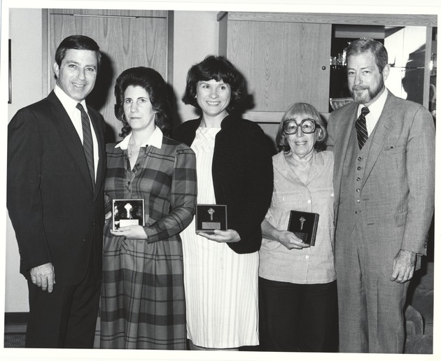 Miami Beach city officials at various events, 1980s - Photograph, recto:[Malcolm Fromberg and Rob Parkins presenting keys to the City to Diana Serousi (center) and two other women, 1987]