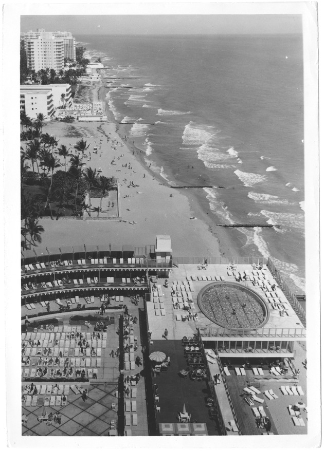 Promotional views of hotel pools and visitors at the Lombardy and the Sorrento Hotel, 1960s - Photograph, recto: [Aerial view of pool at oceanfront hotel]