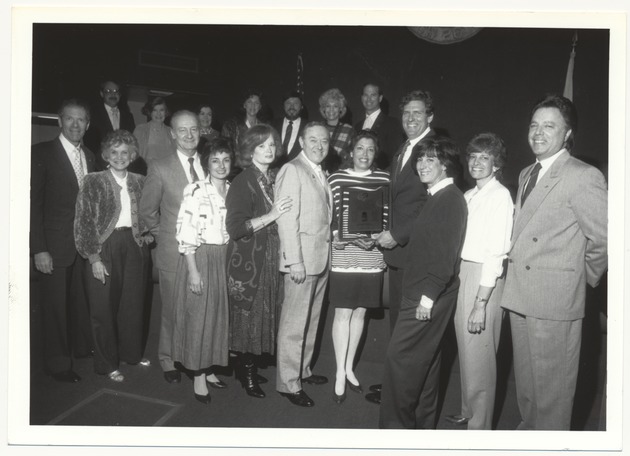 Christmas parties and Alex Daoud victory celebration at City Hall and Miami Beach Youth Center, 1970s and 1980s - Photograph, recto: [View of Alex Daoud and other city officials celebrating his victory]
