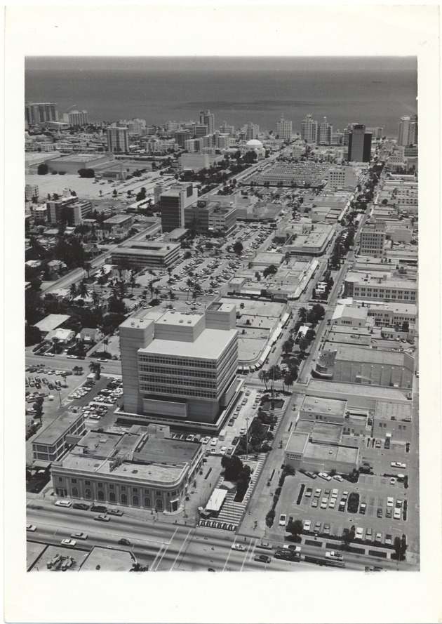 Aerial Views of Miami Beach,1960-1980 - Photograph, recto: [Aerial view of the City of Miami Beach and Lincoln Road]