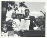 Miami Beach Mayor Alex Daoud presenting awards, 1986 and 1987