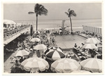 View of hotel pool overlooking the ocean