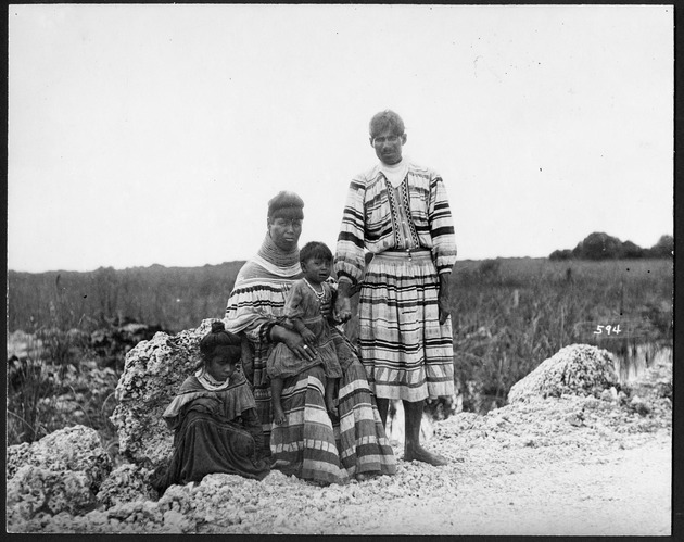 Seminole Indians, 1920-1929 - 1. Family by road through Everglades (probably Tamiami Trail), March 27, 1920? no. 9-30.