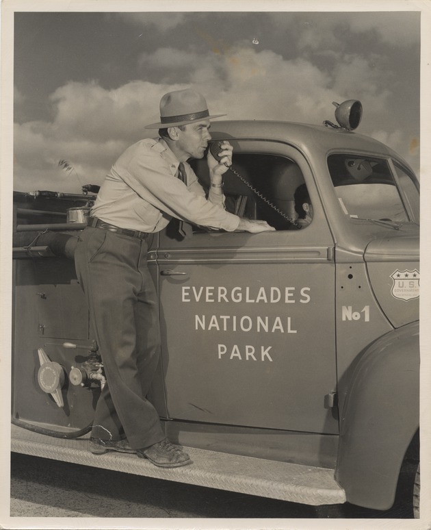 Everglades National Park ranger speaks through two-way radio