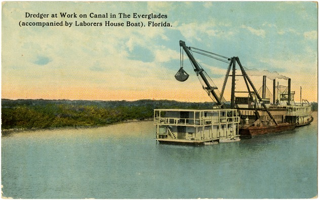 Dredger at work on canal in The Everglades (accompanied by laborers house boat). Florida. - Front