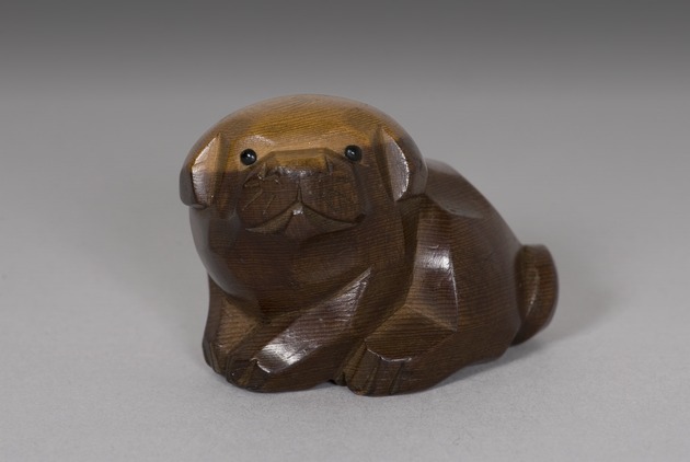 Netsuke: puppy in Ittobori style - artifact front view