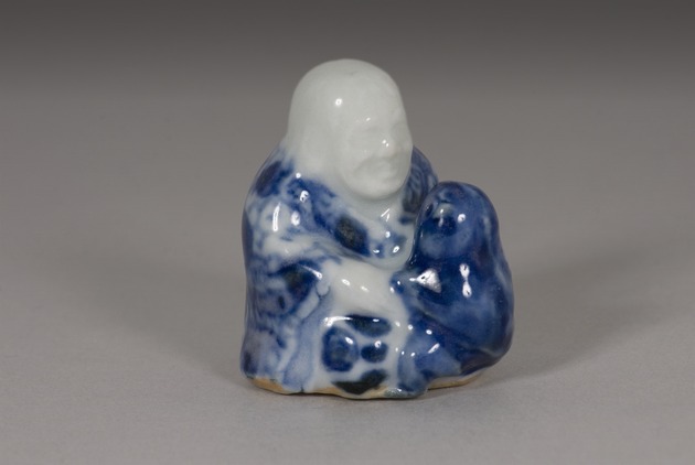 Netsuke: Senin with frog - artifact front view