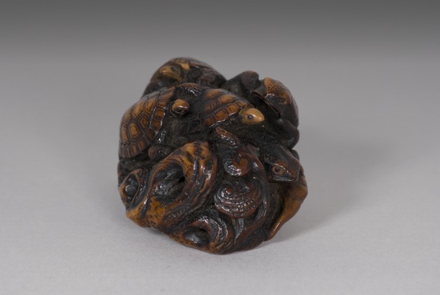 Netsuke: turtles and frogs on lotus pad - artifact front view