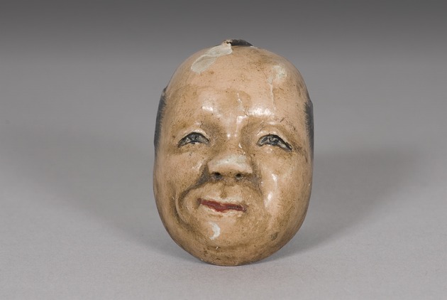 Mask netsuke - artifact front view
