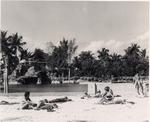 People sunbathing at the Venetian Pool. Coral Gables, Florida