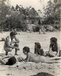 People sunbathing at the Venetian Pool. Coral Gables, Florida