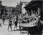 Children gathered in the backyard at the Venetian Pool. Coral Gables, Florida
