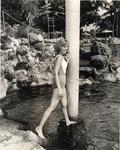 Young woman posing at the Venetian Pool. Coral Gables, Florida