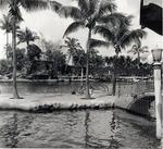 [1980] Couple sunbathing at the Venetian Pool. Coral Gables, Florida