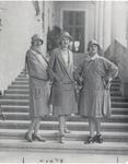 Three women posing at the staircase of the Biltmore Hotel. Coral Gables, Florida