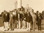 [1932-01] Group portrait next to the flagpole in memory of John McEntee Bowman. Coral Gables, Florida