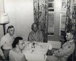[1940/1949] Military officers share a table at the dinning room of Pratt General Hospital former Biltmore Hotel. Coral Gables, Florida