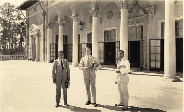 Three men at the courtyard of the Biltmore Country Club. Coral Gables, Florida - Recto