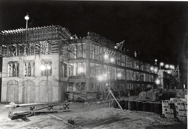 Nighttime view of the San Sebastian Apartment Hotel during construction. Coral Gables, Florida - Recto