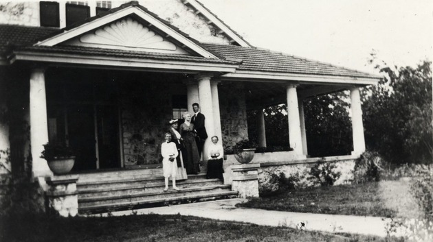 Group portrait at George Merrick's house entrance. Coral Gables, Florida