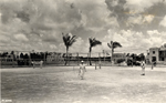 People playing tennis at the Country Club of Coral Gables. Coral Gables, Florida