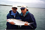 General Norman "Stormin Norman" Schwarzkopf Holding Bonefish with Unidentified Fishing Guide, Islamorada Florida