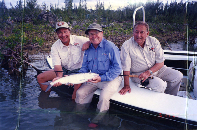 Bass Pro Owner Johnny Morris, Lefty Kreh (holding bonefish), and Islamorada Fishing Guide George Hommel Holding Flyfishing Rod