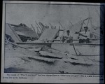 Wrecked boats and men after hurricane