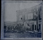 Scenes of wrecked stores on W. Flagler St, beyond the F. E. C. railway tracks