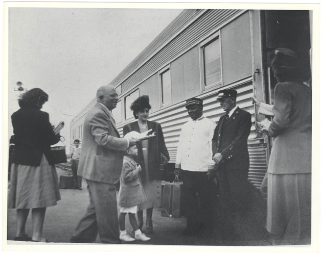 Passengers boarding train