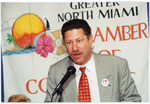 North Miami Mayor Frank Wolland speaks at a North Miami Chamber of Commerce event