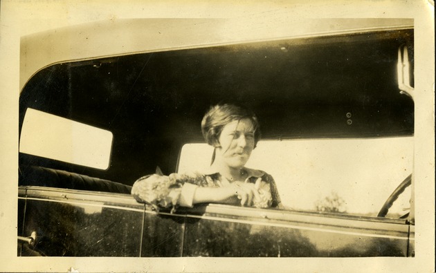 Eva FitzGibbon smoking in a car