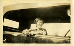 Eva FitzGibbon smoking in a car