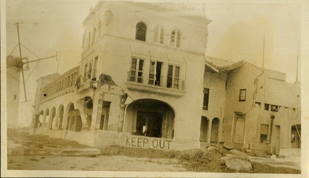 Roman Pools -  Hurricane damage on the building - "Keep Out" sign - Windmill in the rear left side