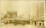 Corner - Flagler and Bayshore Drive - People in street, cars, buildings in background, one under construction