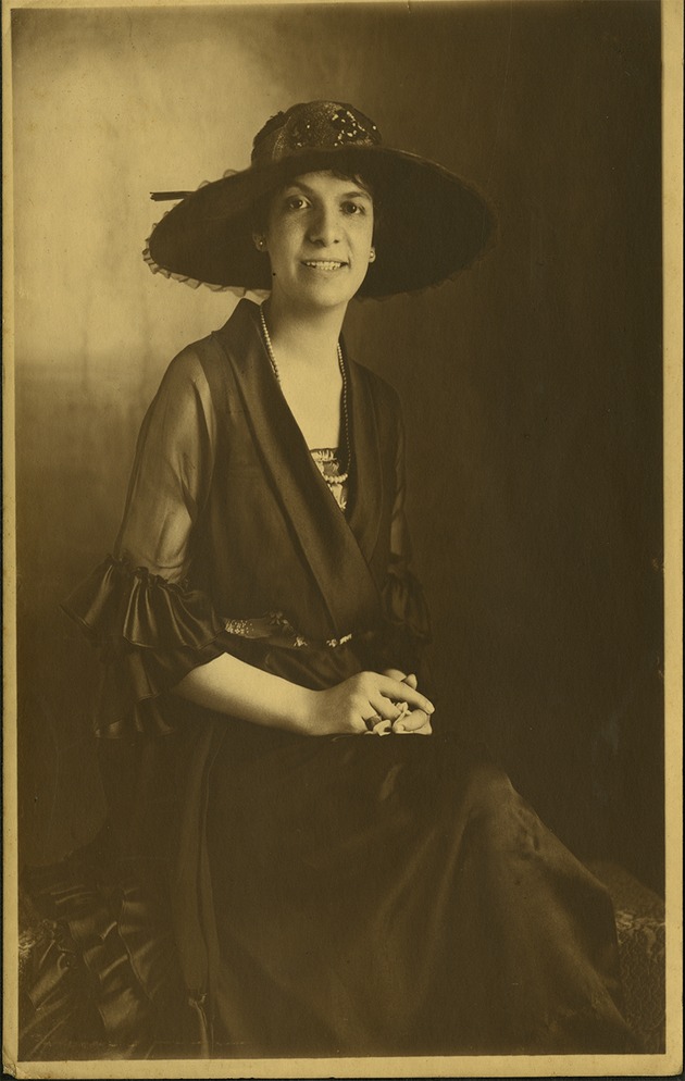 Female portrait - Woman in hat smiling for camera