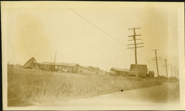 N.W- section - powerlines and home on side of road