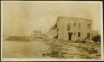 Ocean front homes	- hurricane damaged house with side knocked out near water