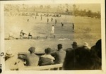 Kickoff 6-0 Miami U vs Loyola - football game, from perspective of spectator sitting on stand