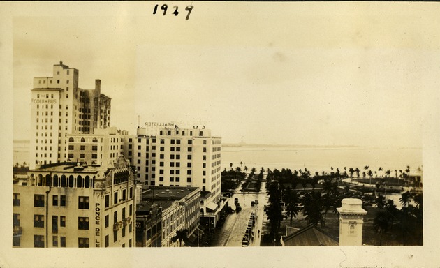 1929 - view from building of multiple buildings and water