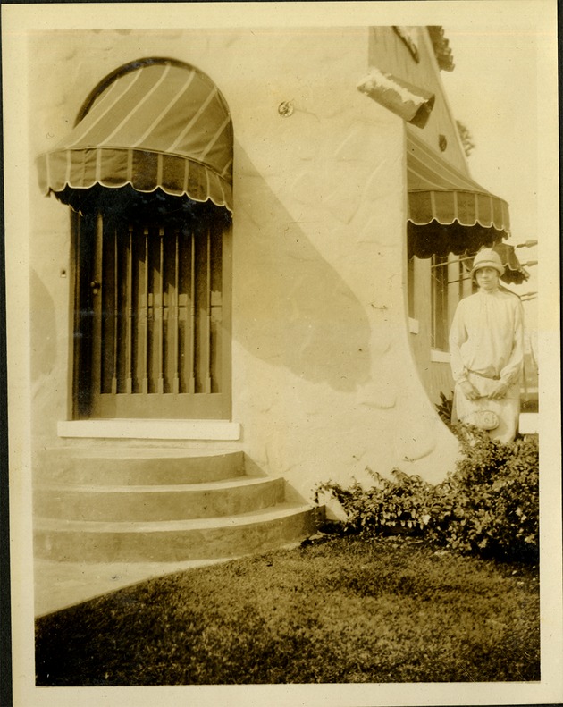 At home more or less! - woman standing near home