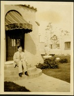 At home more or less! - man sitting on front steps of home