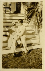 Discovered - Man and woman sitting on steps smiling at each other